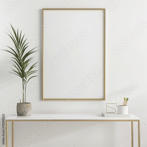 A4 white frame mockup with a potted plant and a book on a white table against a white wall.