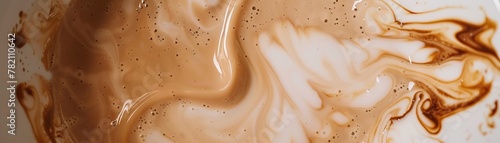 Soft browns swirl into coffee as oat milk is poured, transforming the drink into an earthy elixir, bridging the gap between nature and nourishment low noise