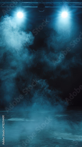 Moody blue stage lights emerge from a dense fog, crafting a scene of intrigue and mystique in a dark space.