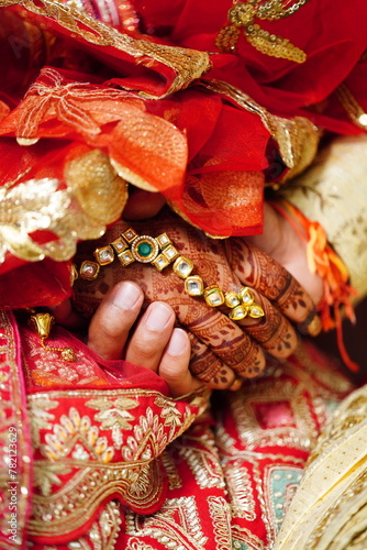 Mumbai, India 9th April 2024: Indian Wedding rituals, Customs and Traditions for bride or Dulhan. Pandit performing holy pooja. Shagun, Mehendi, and old customs. Couple holding hands during marriage