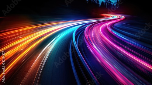 Multicolored light trails against a dark background