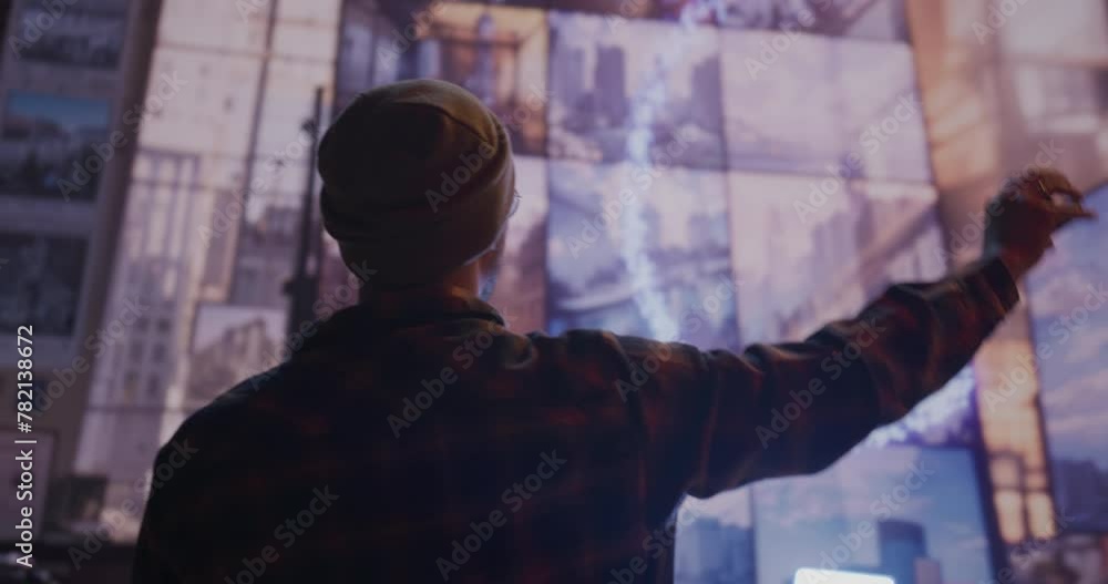 A Man Standing In Front Of A Virtual Screen With A Hand Up Science Museum Video Art Motion Graphics A Man Standing In Front Of A Virtual Screen With A Hand Up Science Museum Video Art Motion Graphics