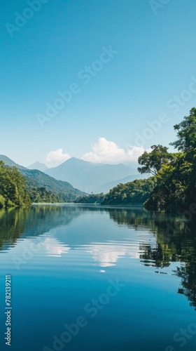 lakeside retreat with calm waters, forested shores, and a distant mountain backdrop, under a clear summer sky,