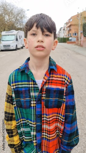 10 yearsold boy walking and posing photo