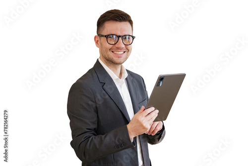 The manager is a positive man in a suit using a tablet.