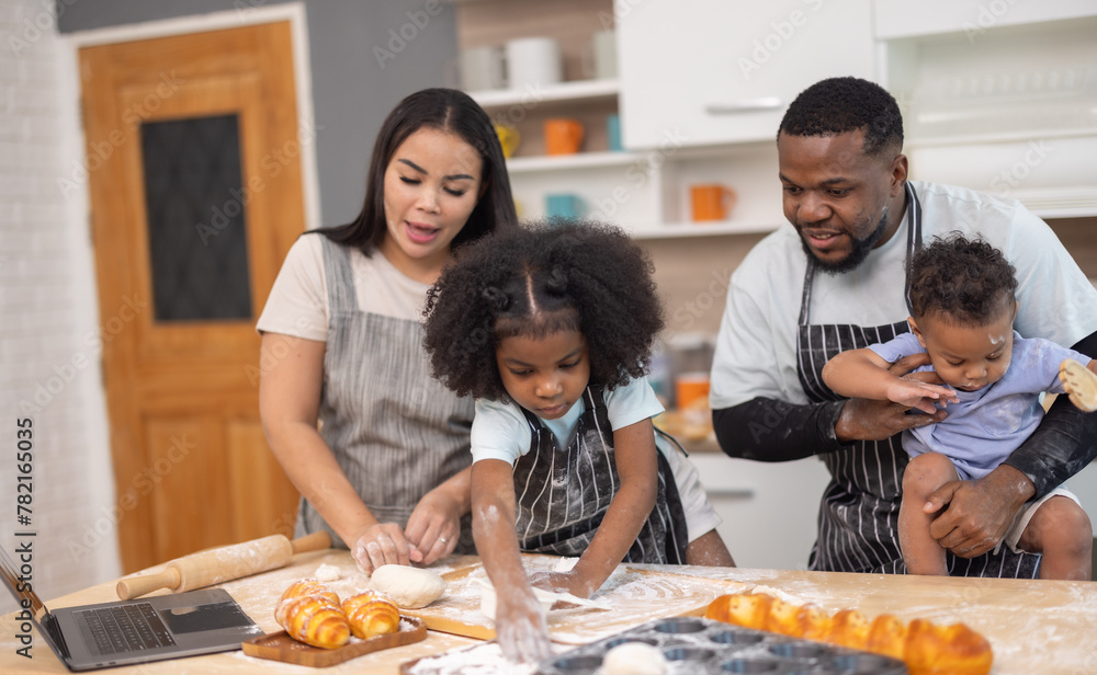 Family Bonding Over Baking Bread Using Online Recipe in Cozy Home Kitchen Family Bonding Over Baking Bread Using Online Recipe in Cozy Home Kitchen
