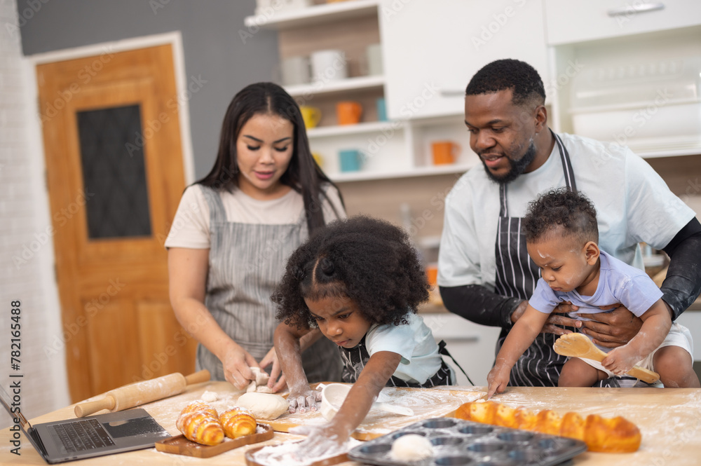 Family Bonding Over Baking Bread Using Online Recipe in Cozy Home Kitchen