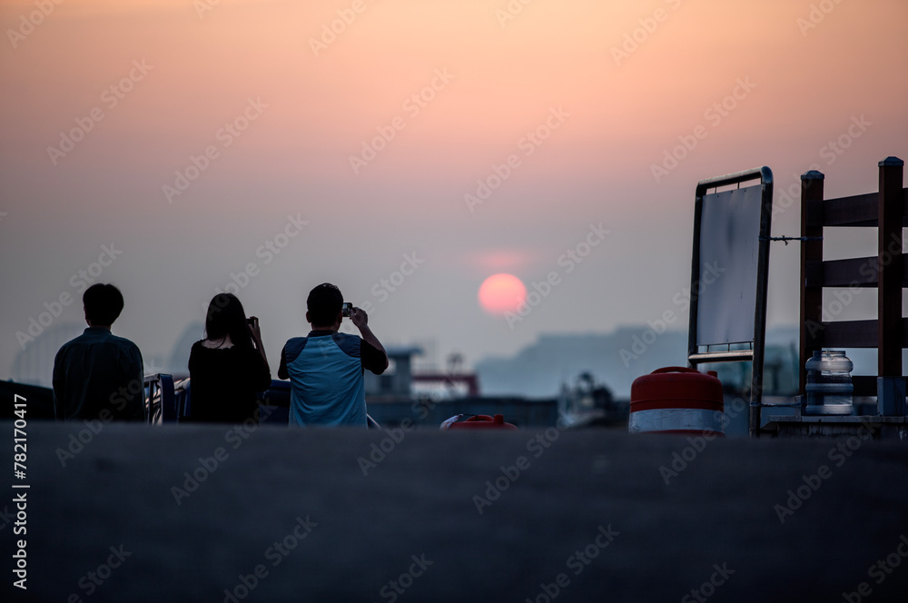 View of the tourists watching the sunset