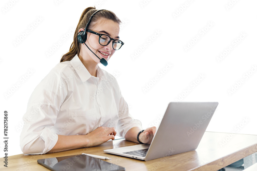 A young female consultant operator uses a microphone and internet in the office laptop. Isolated background.