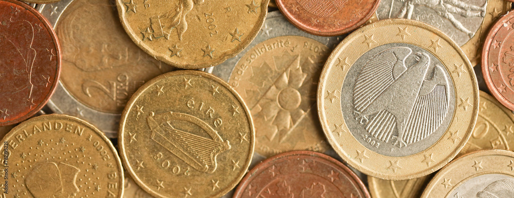 European money euro coins. Shiny coins of European union currency close up European money euro coins. Shiny coins of European union currency close up