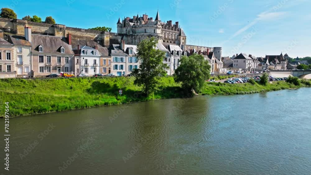 Aerial view of a former medieval fortress built on a rocky spur overlooking the River Loire and the town of Amboise. Gothic and Renaissance castle The Royal Château of Amboise in France. Aerial view of a former medieval fortress built on a rocky spur overlooking the River Loire and the town of Amboise. Gothic and Renaissance castle The Royal Château of Amboise in France.