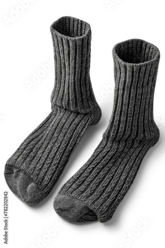 Pair of gray socks on a plain white background. Suitable for fashion or clothing concepts