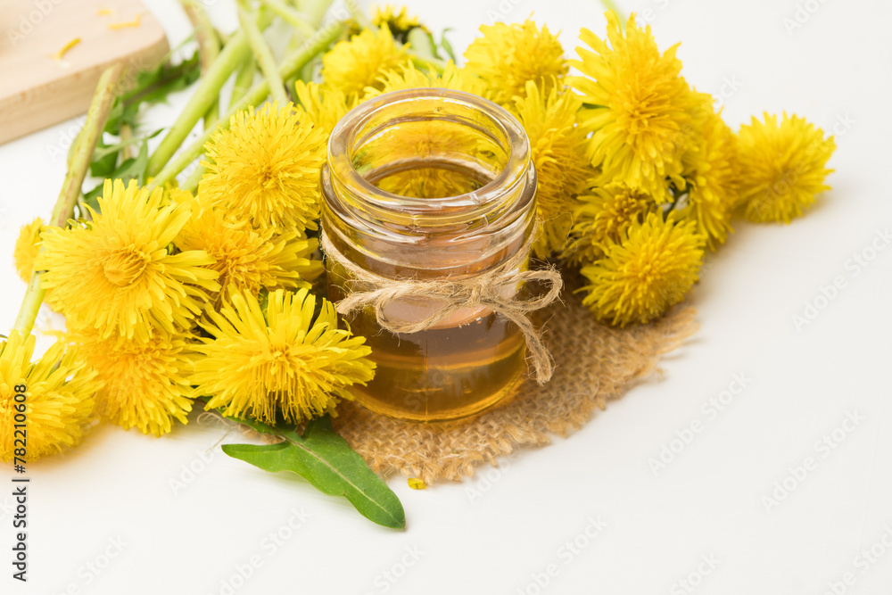 Syrup, dandelion honey, composition with fresh flowers Syrup, dandelion honey, composition with fresh flowers