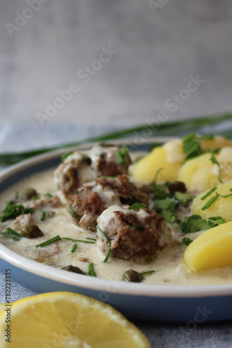 Classic Comfort: Homemade Königsberger Meatballs with Caper Sauce and Boiled Potatoes