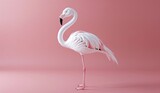 Elegant flamingo standing on one leg on a pink background