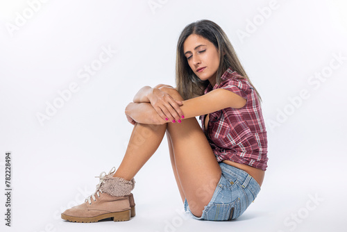 Woman wearing jeans checkered shirt