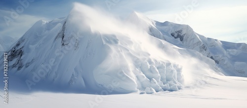 Skiers skiing snowy mountain backdrop photo