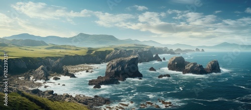 Rocky Coastline with Cliffs and Waves photo