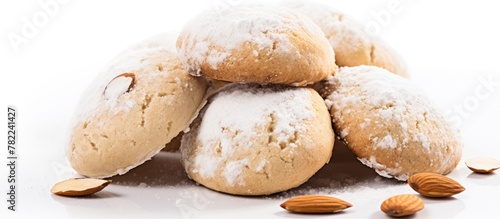 Pile of almond cookies dusted with sugar