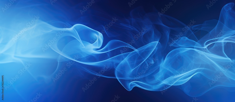 Blue smoke wisps in air on a background Blue smoke wisps in air on a background
