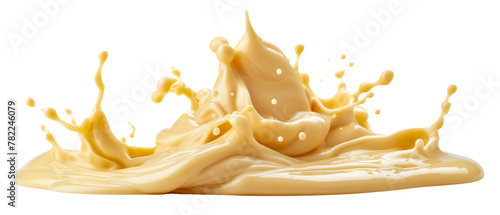 Splash of creamy yellow liquid on a white background