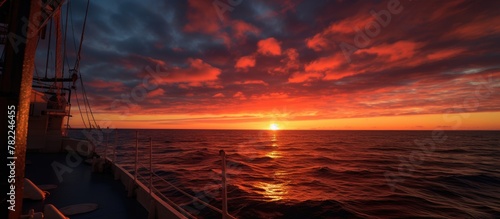 Sunset on the horizon from a seismic ship
