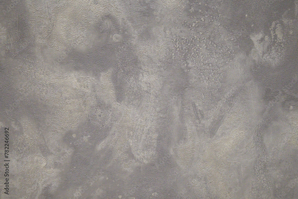Gray textured wall surface. Rough stylized texture. Abstract decorative background. Old effect background for wallpaper or graphic design. Gray textured wall surface. Rough stylized texture. Abstract decorative background. Old effect background for wallpaper or graphic design.