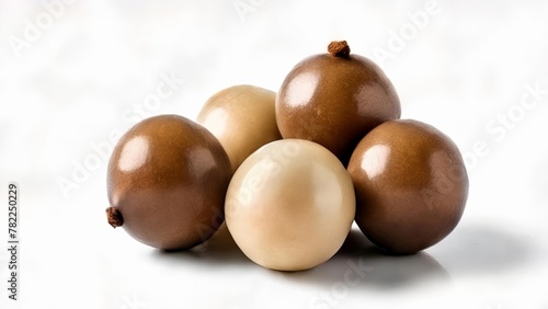  A collection of six shiny brown and white eggs photo