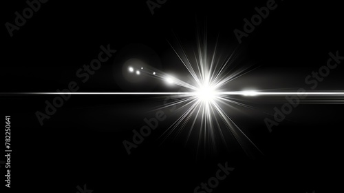 A bright white light shines against a black background. The light is surrounded by a soft glow, and there are several small lens flares visible. photo