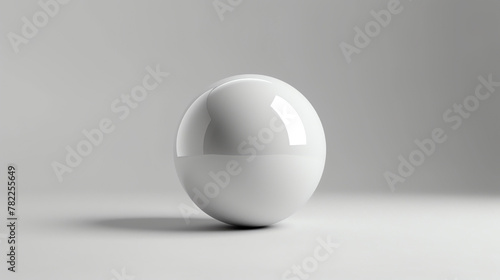 3D rendering of a white sphere on a white background. The sphere is made of a reflective material and is lit by a single light source.