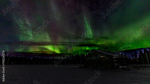 Cloudy sky with Aurora Borealis