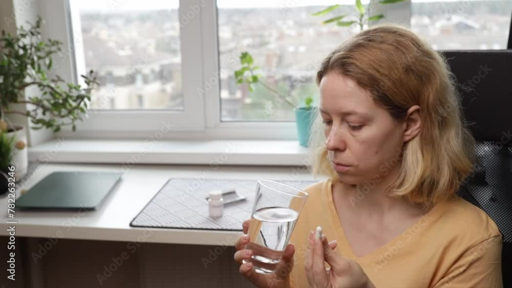 Abortion tablets, woman drinking medication, healthcare decision, pregnancy termination Abortion tablets, woman drinking medication, healthcare decision, pregnancy termination