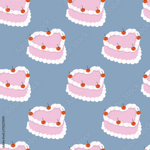 Seamless pattern with heart shaped cakes with cherry. Vector illustration.
