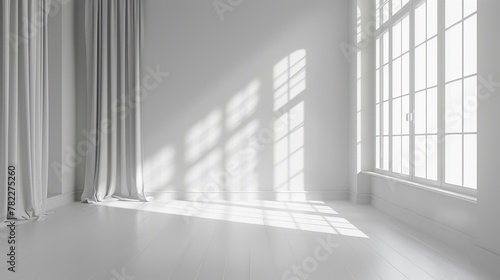 Bright empty room with large windows and white walls