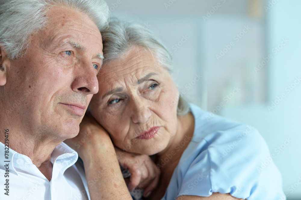 Close up portrait of sad senior couple posing Close up portrait of sad senior couple posing