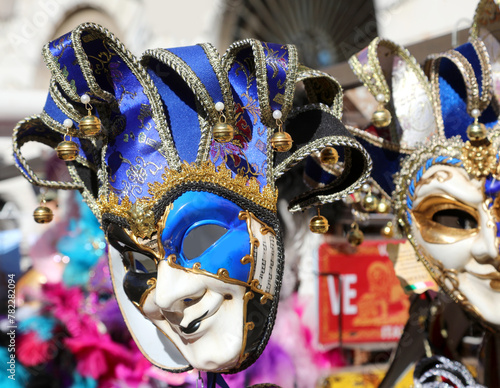Venetian carnival masks for sale at a stall in Piazza San Marco during the festival