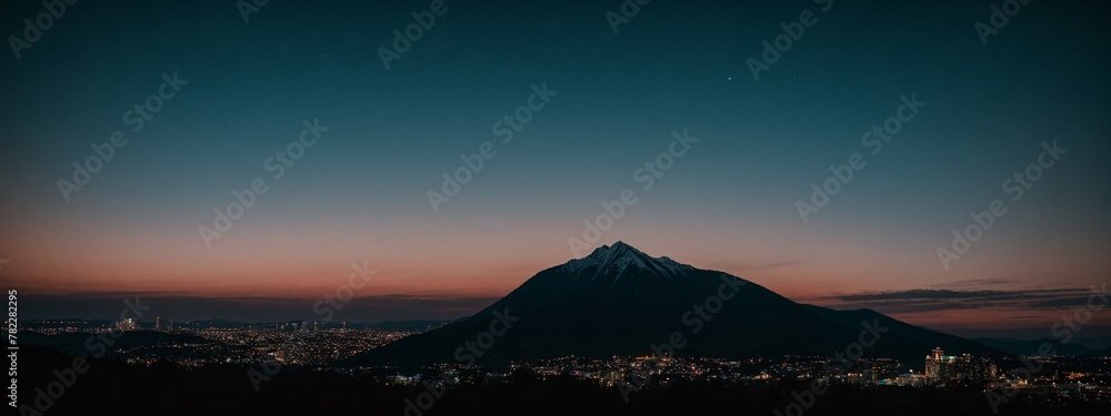 panorama of the night, evening city at the foot of the mountain. for banner, poster, flyer, advertising, interior. 