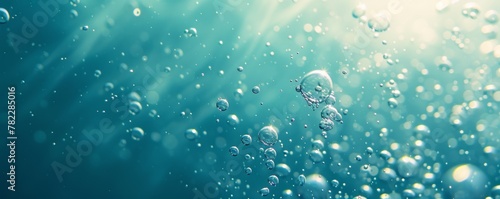 Underwater scene with sunbeams and air bubbles