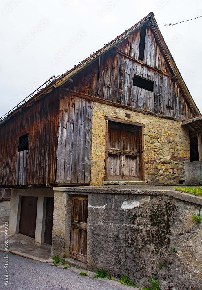 An old and now disused farming building in village of Ovaro in Udine Province, Friuli-Venezia Giulia, north east Italy An old and now disused farming building in village of Ovaro in Udine Province, Friuli-Venezia Giulia, north east Italy