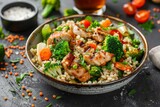 Barley and broccoli salad with fried chicken on rustic background