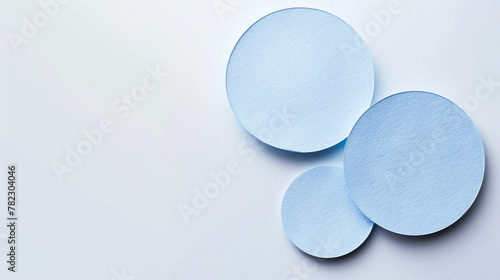 Volumetric blue circles are located on a pale blue background. Banner with copy space.
