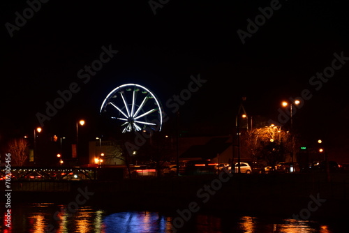 Ferris wheel at night on St. Patrick's Day. Kilkenny, Ireland © Audrius