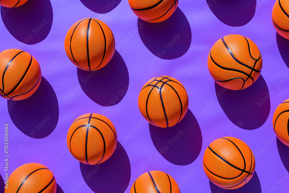 Pattern of basketballs on purple background sports equipment, team sports, basketball, sports equipment arrangement, sports background concept