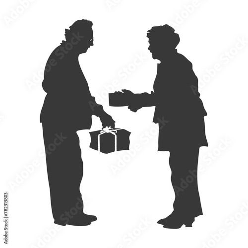 Silhouette elderly couple exchanging gifts black color only