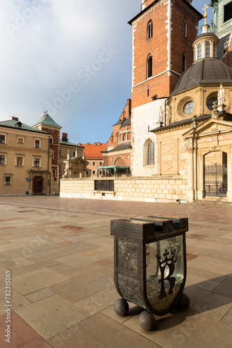 Money box to raise money for the restoration of Krakow's monuments of Krakow on 13th century Wawel Royal Castle, Krakow, Poland