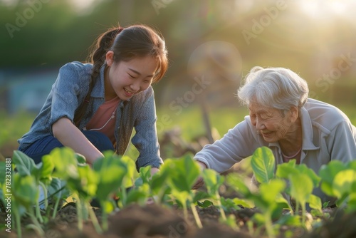 Generations Bonding - Young Asian Woman and Senior Gardening Together at Dusk