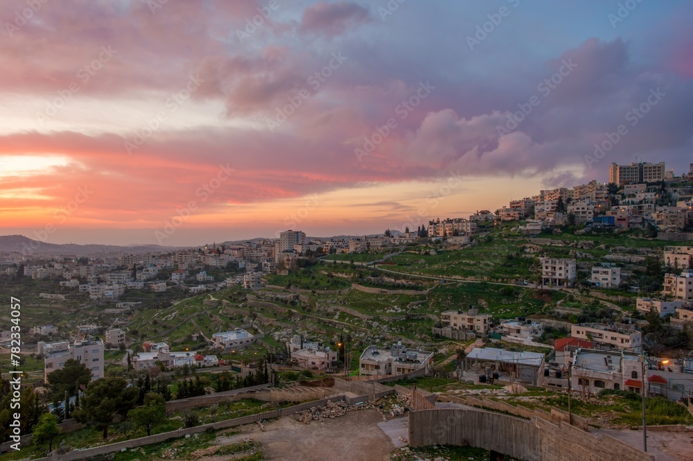 Sunrise in Palestine, a peaceful landscape at dawn. night lights in old historical biblical city Bethlehem in palestine region in Israel. Bethlehem city at the morning.