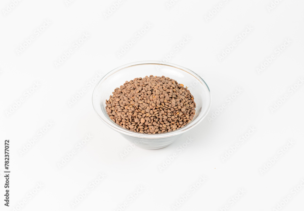 top view of lentils in a glass bowl on a white background top view of lentils in a glass bowl on a white background