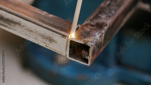 Fotografie Close-up of welding torch igniting