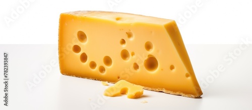 Maasdam cheese on white bac...